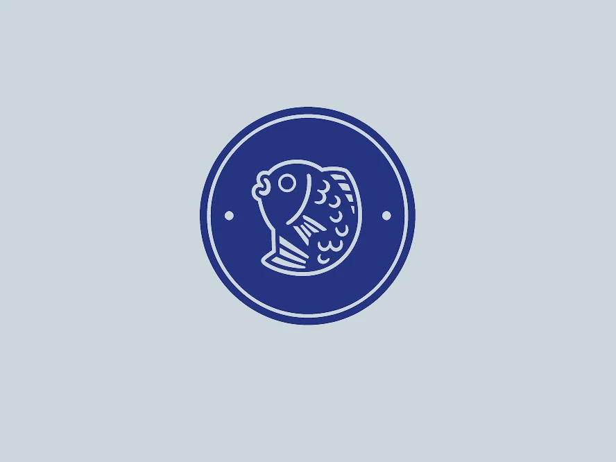 Blue circular logo with a white line drawing of a fish on a pale blue background.